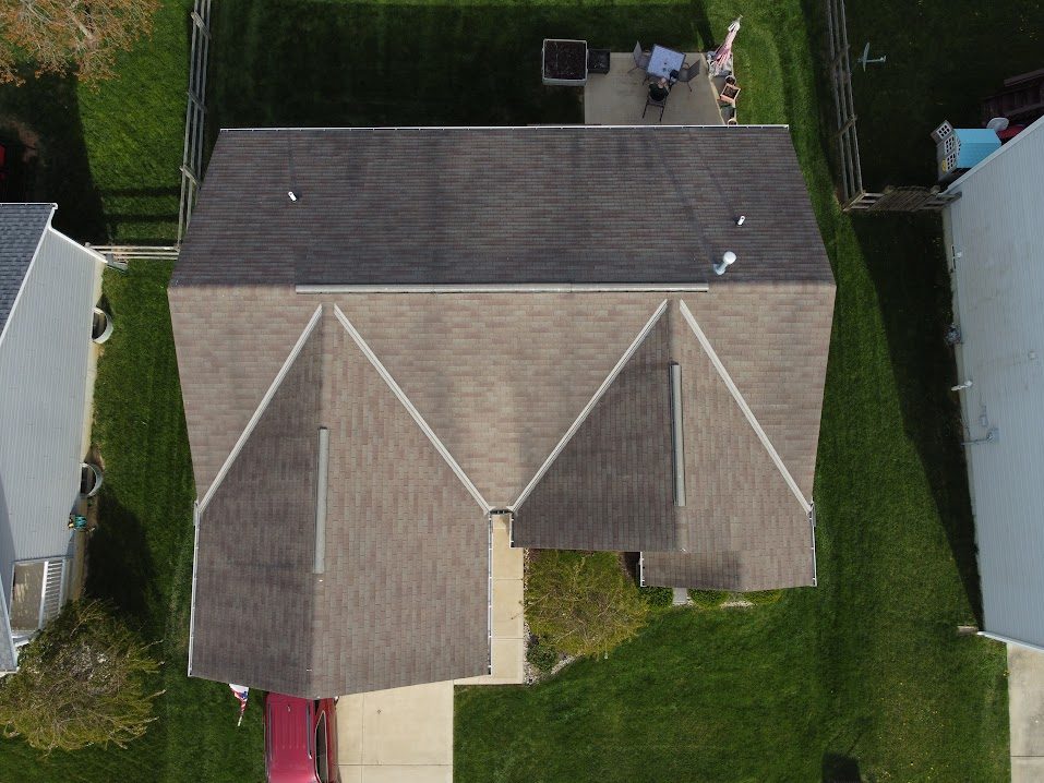 Roof cleaning before, algae and dark staining on asphalt shingles