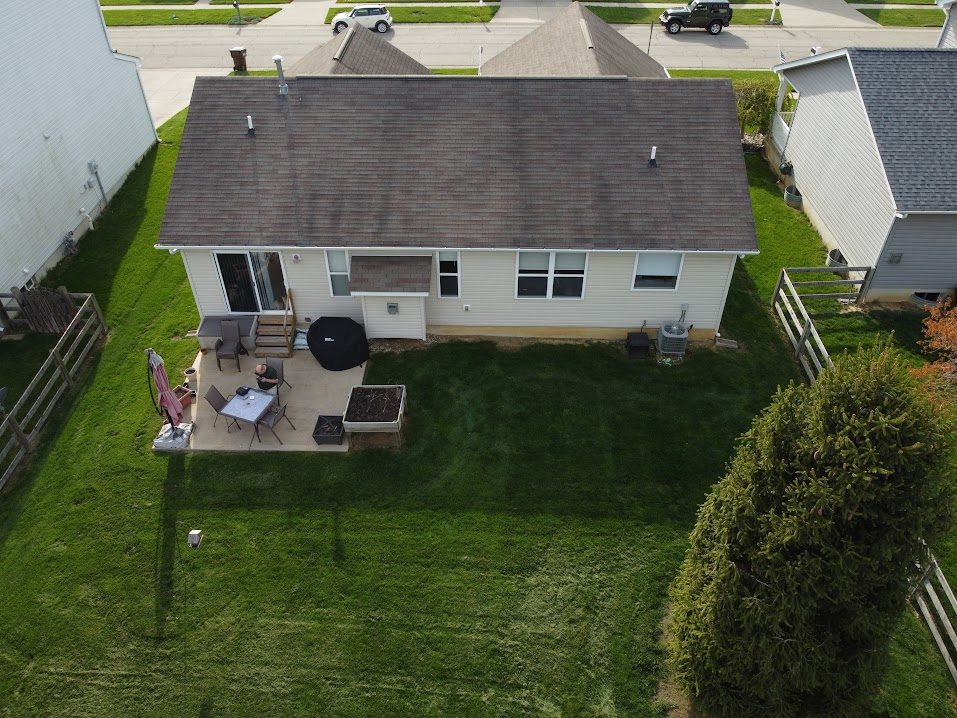 Roof soft wash before, algae streaks on residential roof Warren County OH