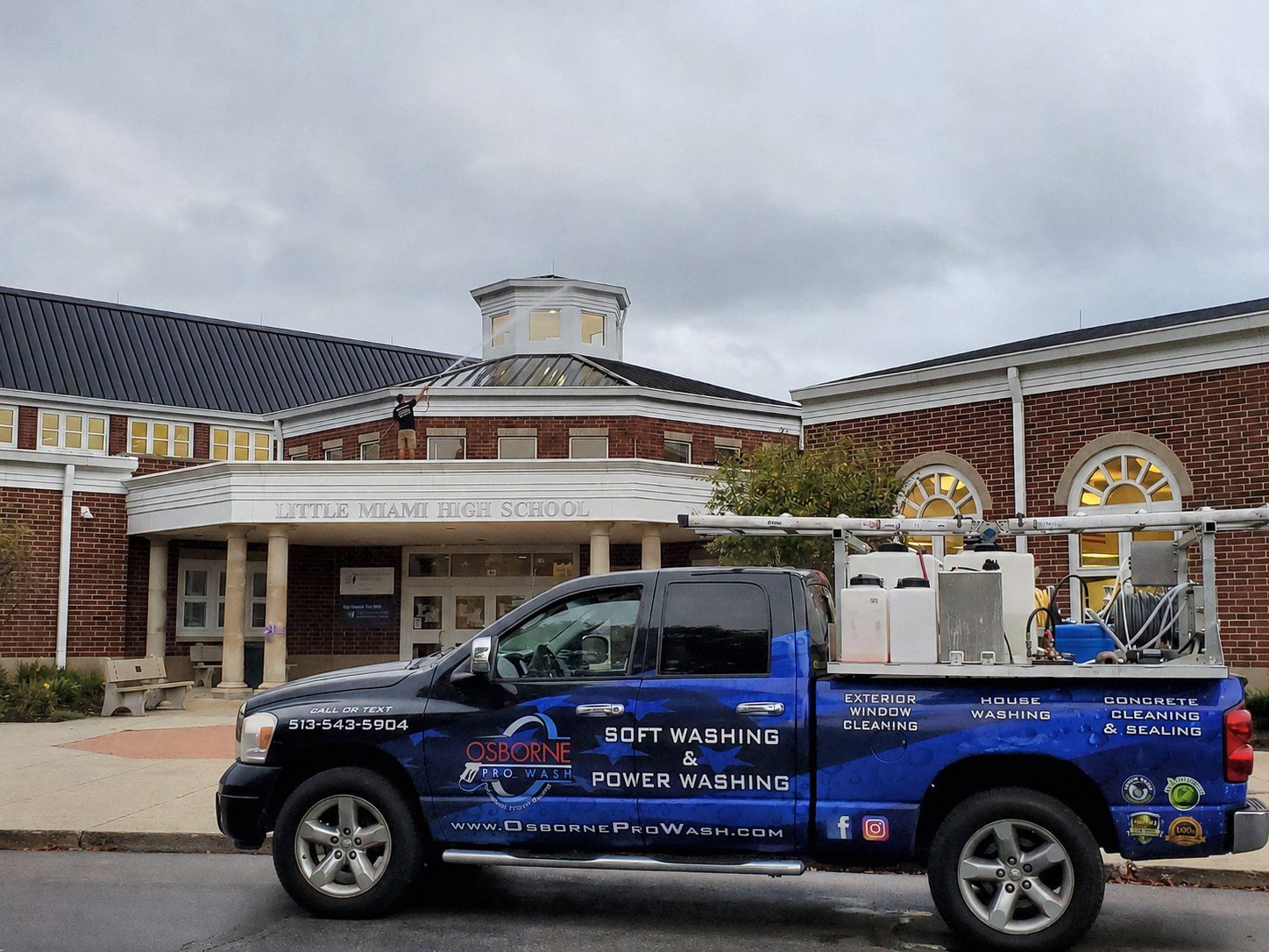Osborne Pro Wash truck parked in front of Little Miami High School during a soft wash job