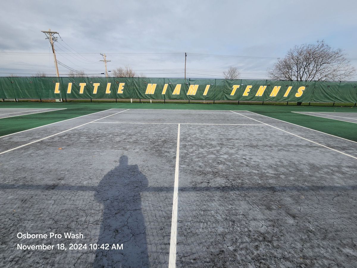 Little Miami High School tennis court before soft washing, covered in algae and mildew